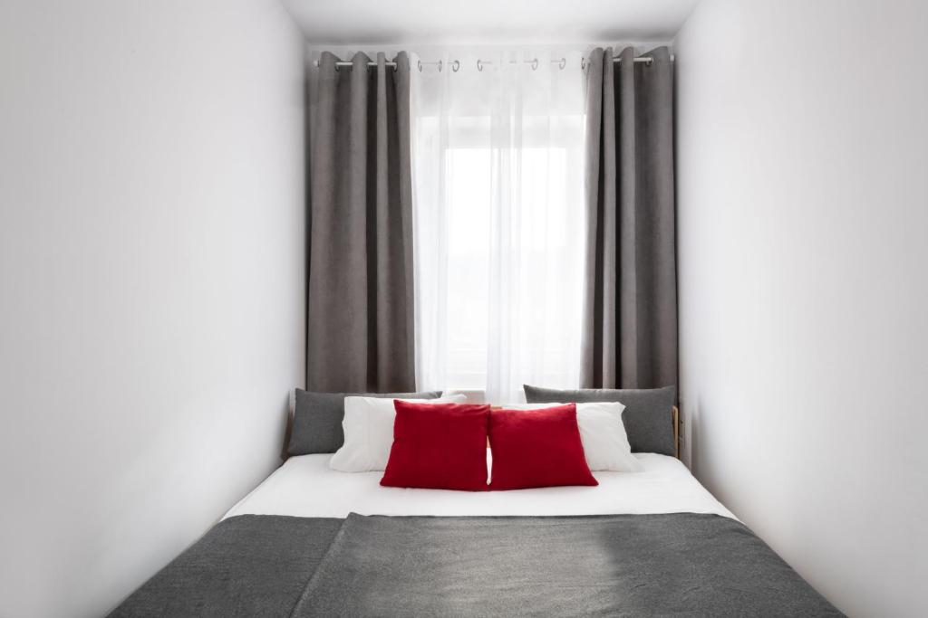 Posteľ alebo postele v izbe v ubytovaní Halna Residence