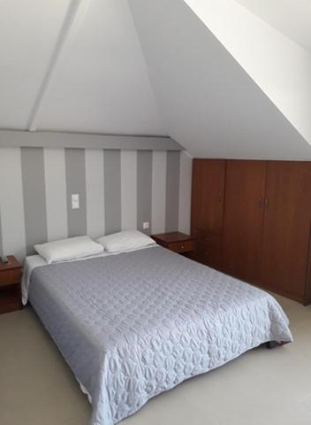 Postel nebo postele na pokoji v ubytování Elektra Hotel