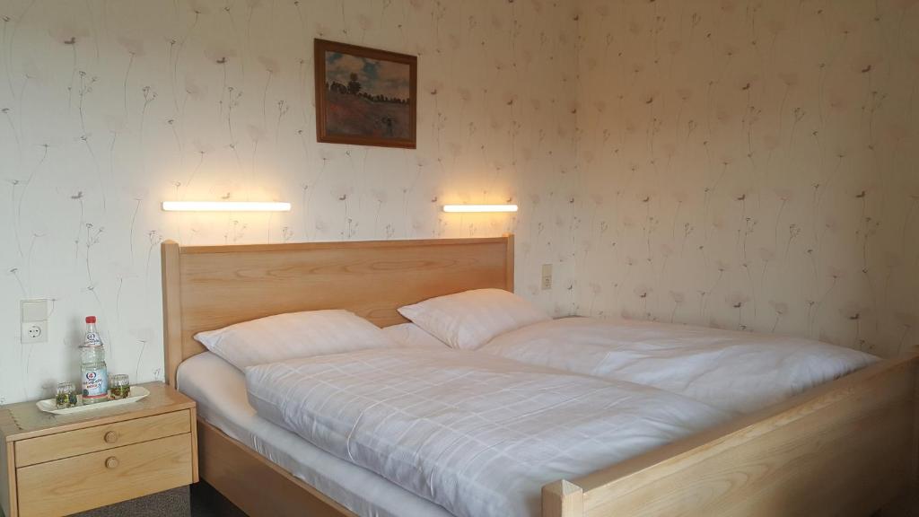 Postel nebo postele na pokoji v ubytování Gästehaus Fleck