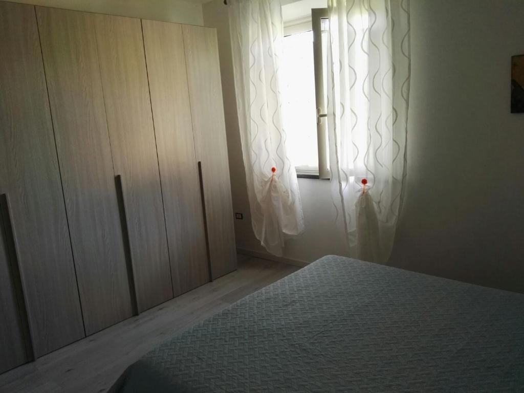 Postel nebo postele na pokoji v ubytování Sa Domu e Muru