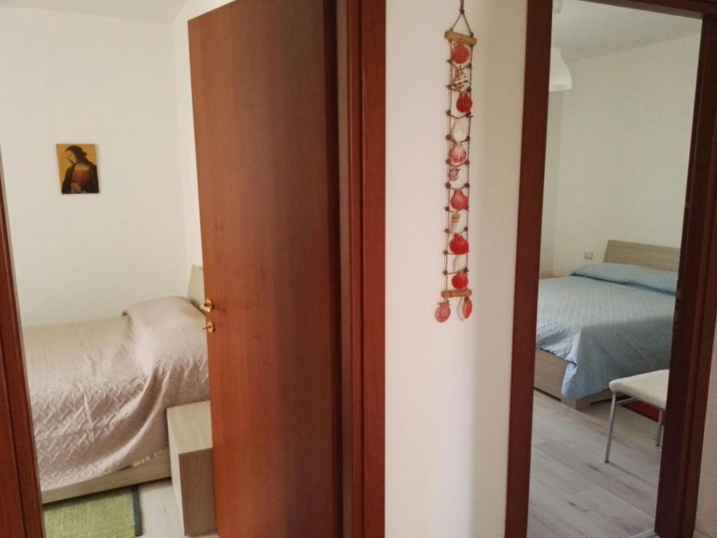 Postel nebo postele na pokoji v ubytování Sa Domu e Muru