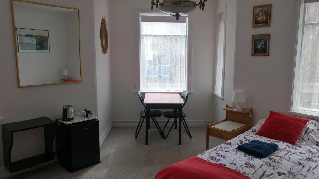 Postel nebo postele na pokoji v ubytování Guesthouse Sólgardar