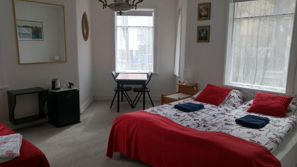 Postel nebo postele na pokoji v ubytování Guesthouse Sólgardar