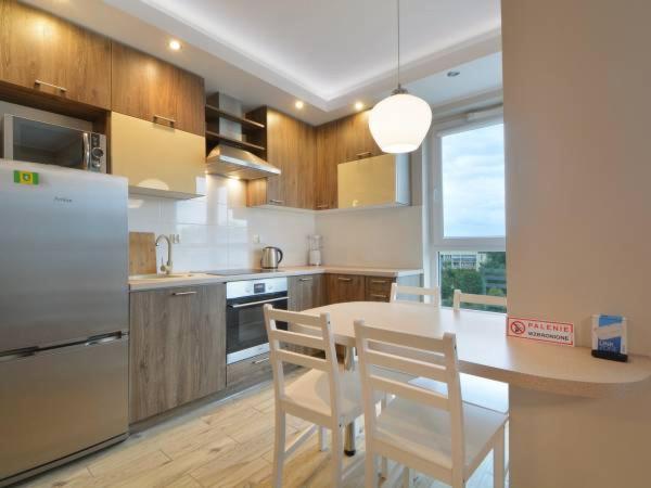 Kuchyňa alebo kuchynka v ubytovaní Apartament w Gdańsku blisko morza