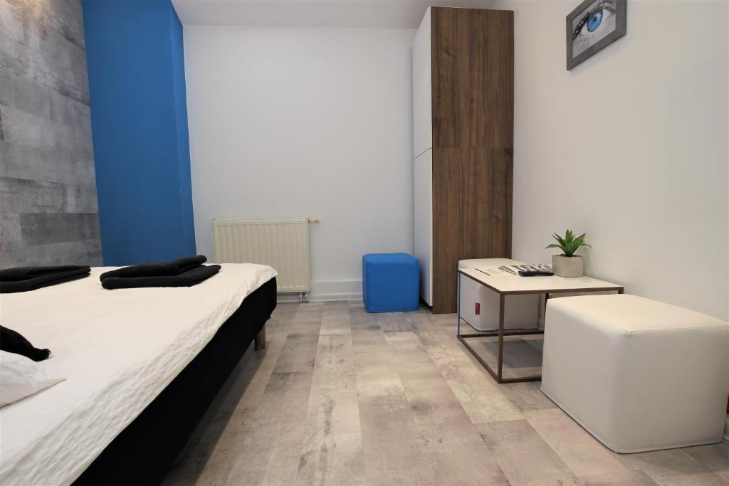Posteľ alebo postele v izbe v ubytovaní Rainbow Apartments 1