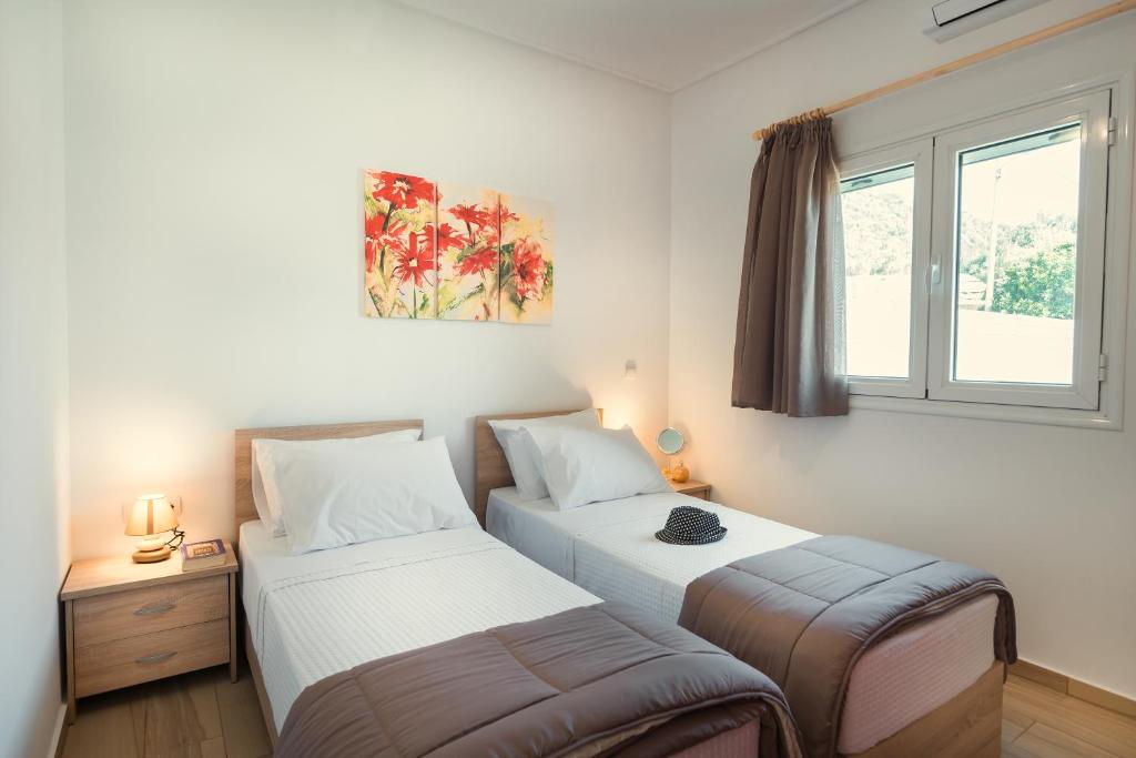 Posteľ alebo postele v izbe v ubytovaní Abeli Villas