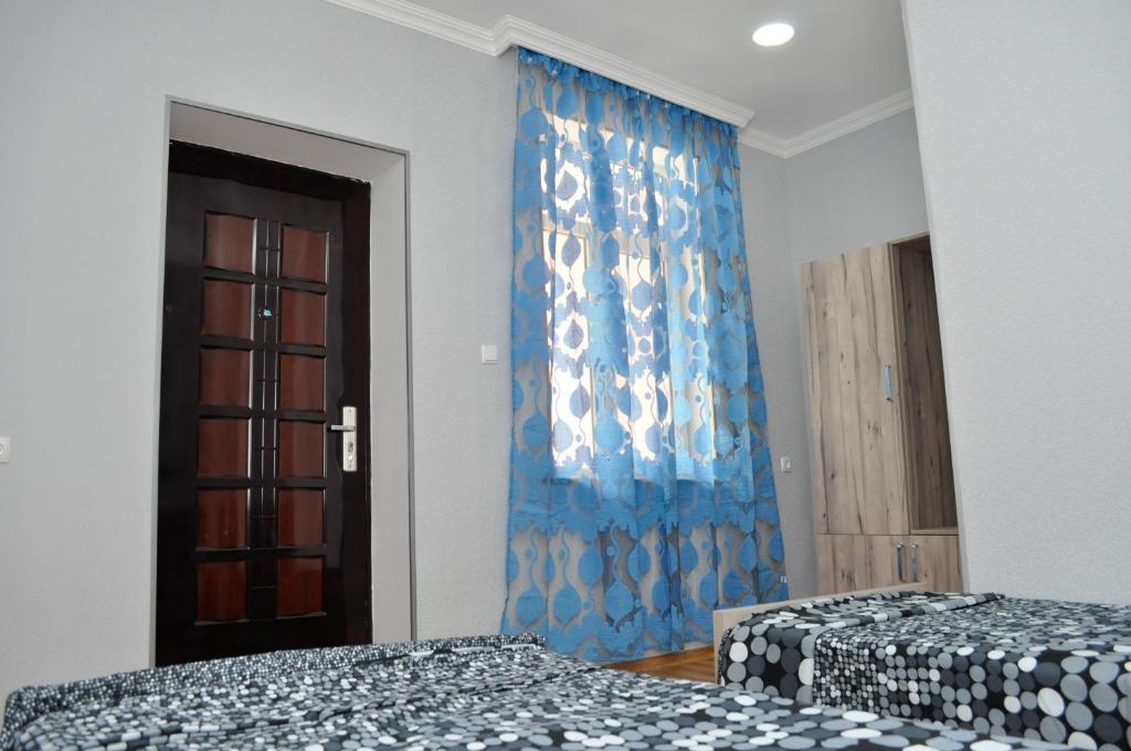 Postel nebo postele na pokoji v ubytování Sofia Guest House