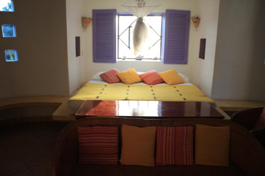 Postel nebo postele na pokoji v ubytování Amaranto Bed and Breakfast