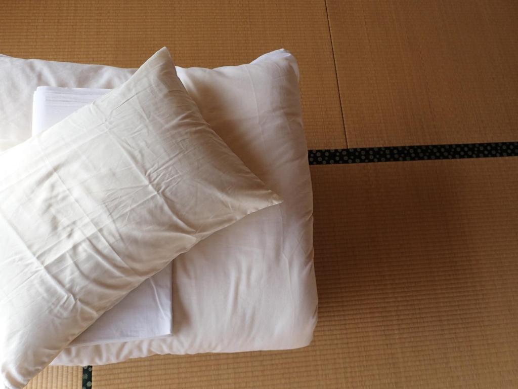 Postel nebo postele na pokoji v ubytování Guesthouse SORA