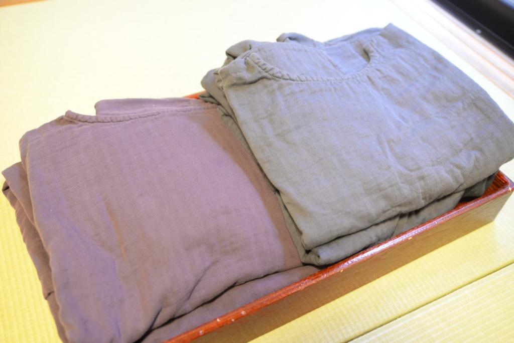 Postel nebo postele na pokoji v ubytování Yamashinobu