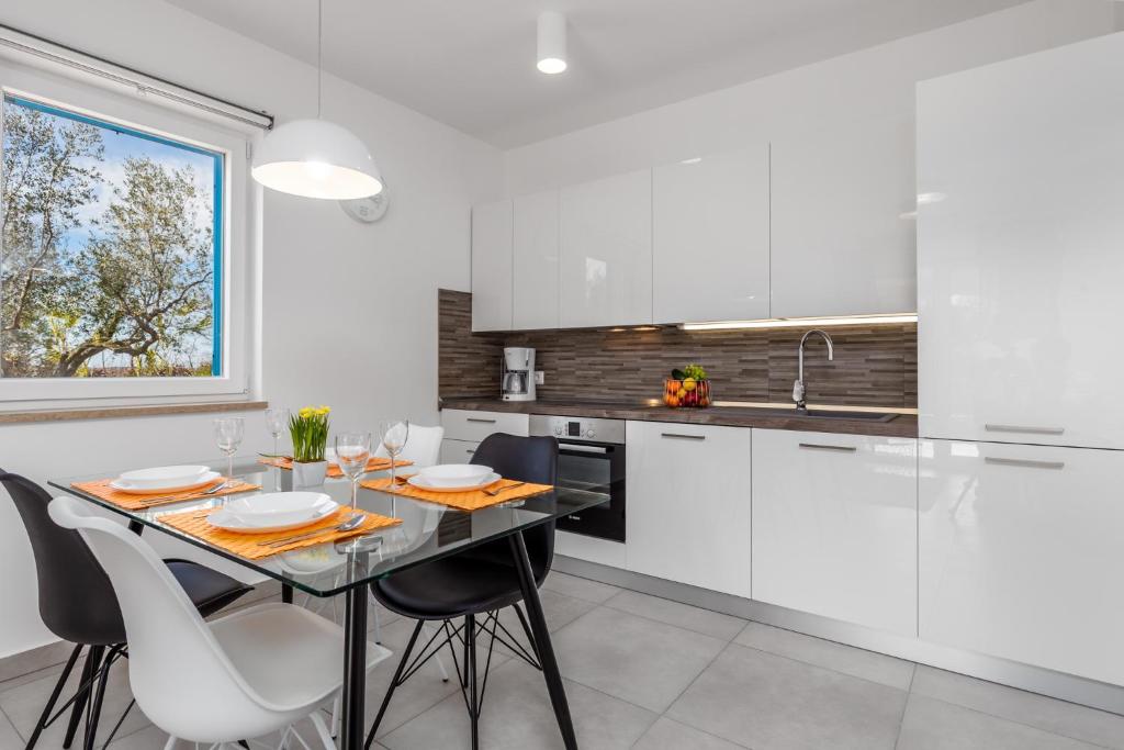 Kuchyňa alebo kuchynka v ubytovaní Olea Residence