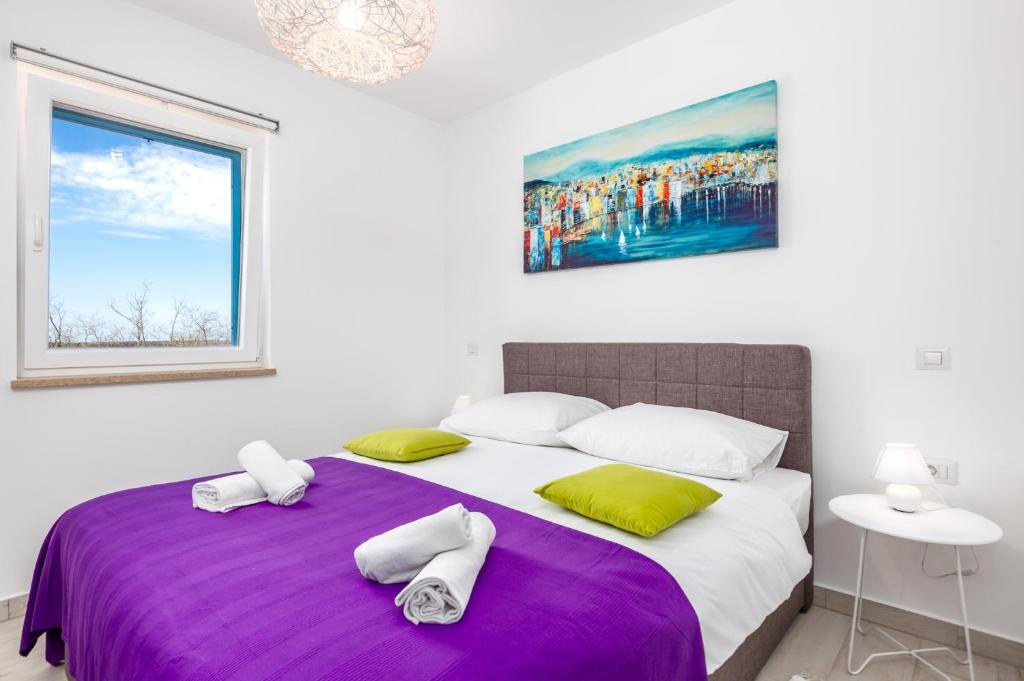 Posteľ alebo postele v izbe v ubytovaní Olea Residence