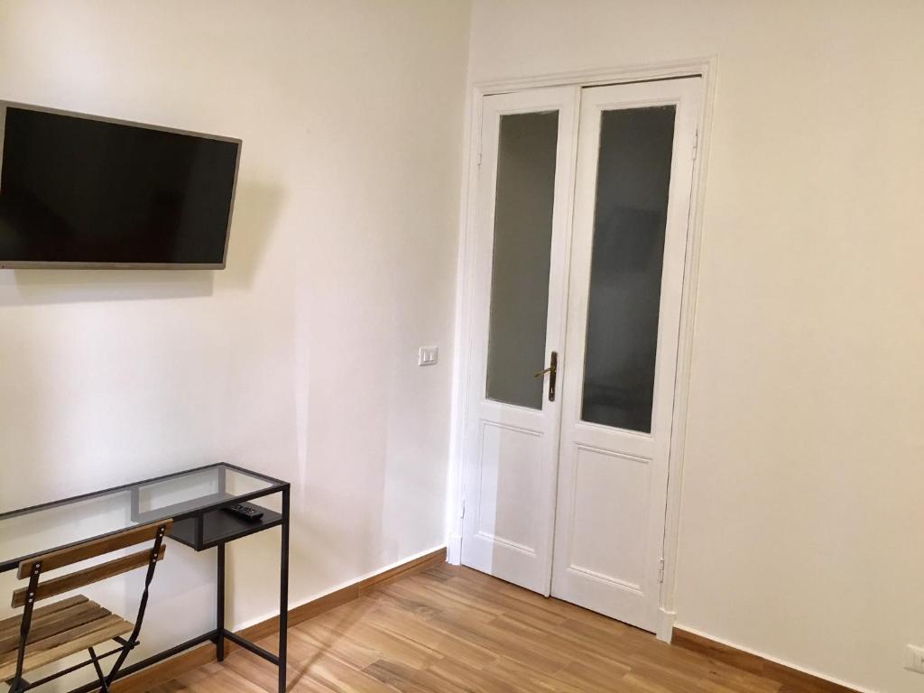 TV a/nebo společenská místnost v ubytování Cavallotti 21