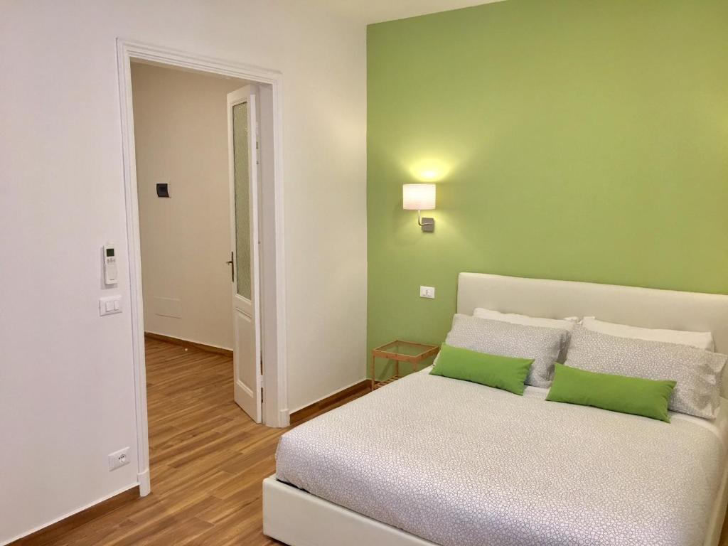 Postel nebo postele na pokoji v ubytování Cavallotti 21