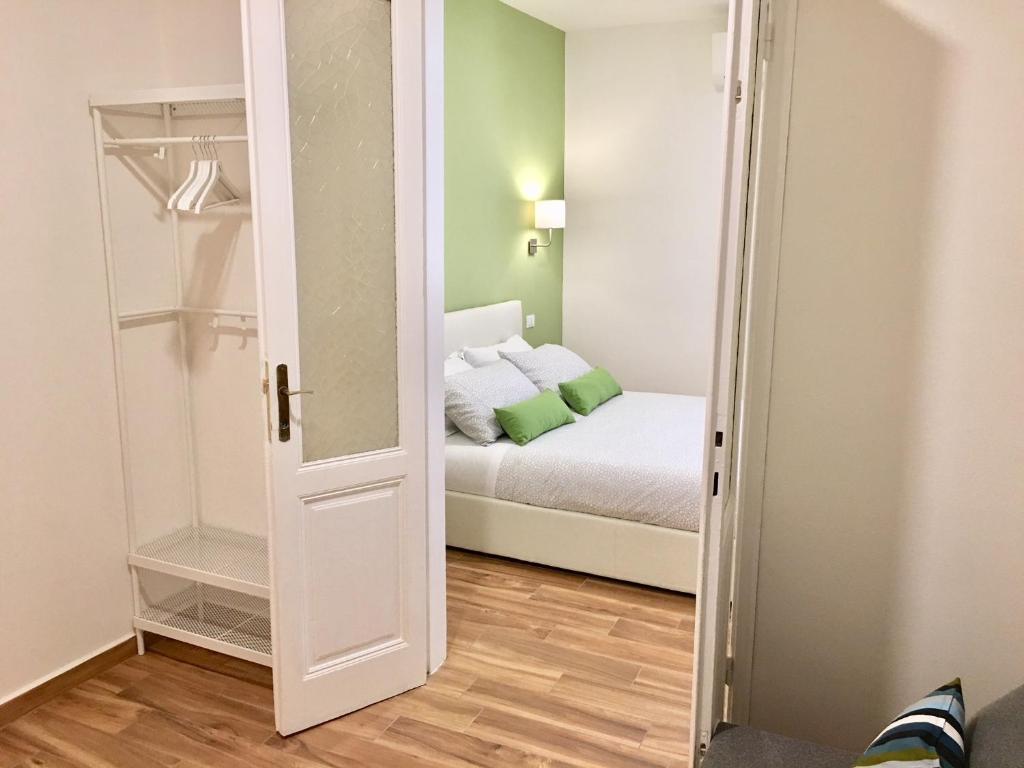 Postel nebo postele na pokoji v ubytování Cavallotti 21