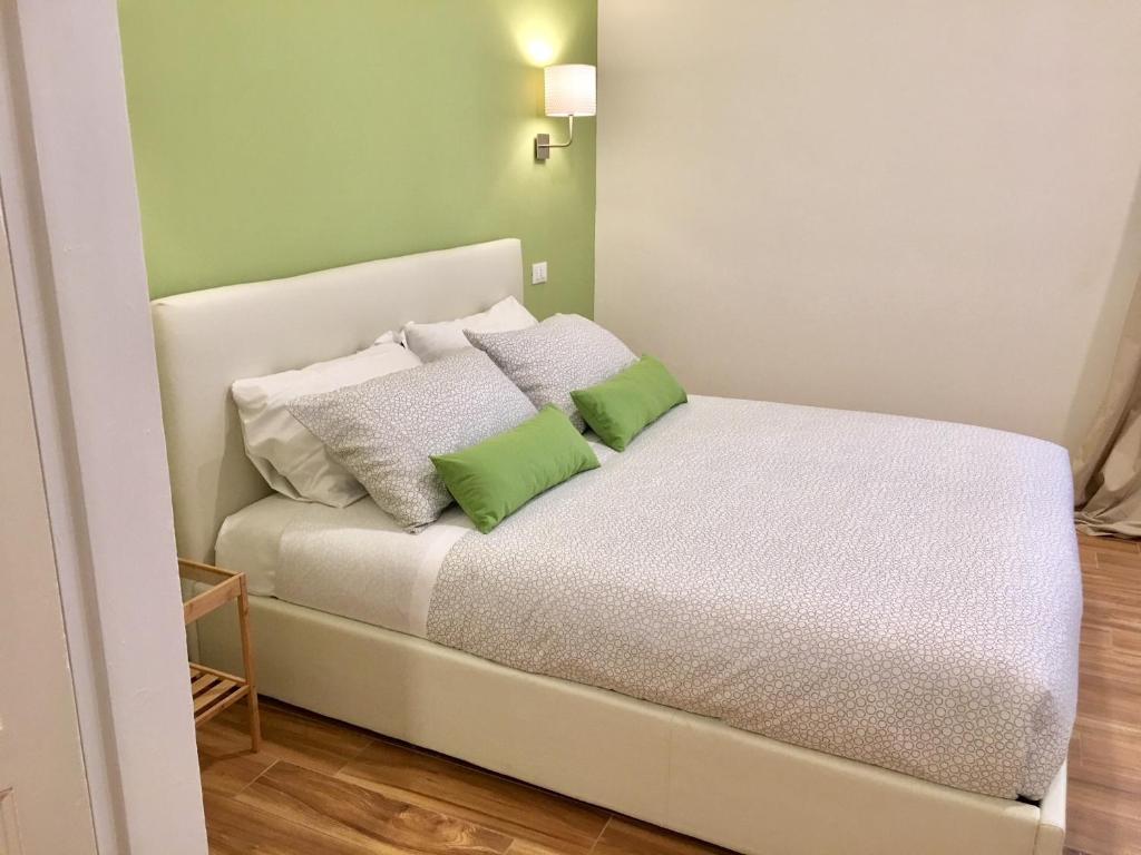 Postel nebo postele na pokoji v ubytování Cavallotti 21