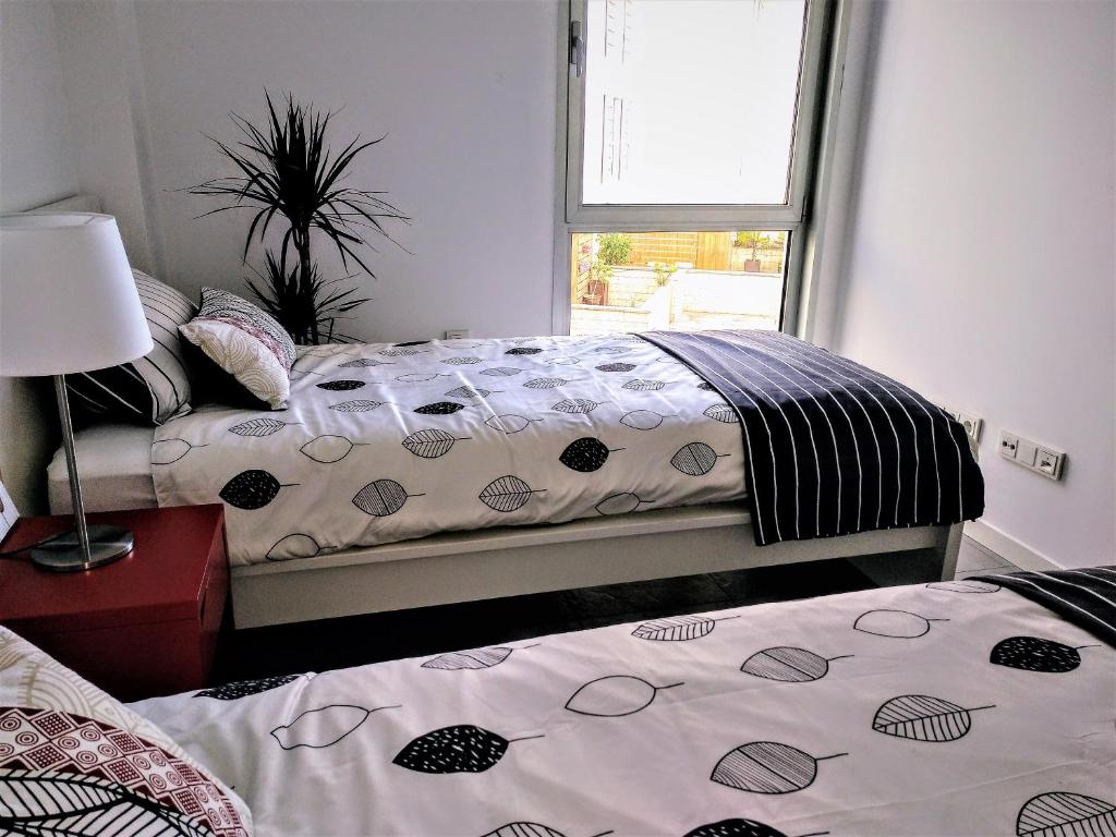 Postel nebo postele na pokoji v ubytování Nuevo y acogedor duplex frente al mar
