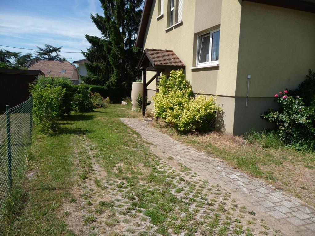 a dirt road in front of a house at Appartement Sur La Route des Vins d'Alsace in Cernay