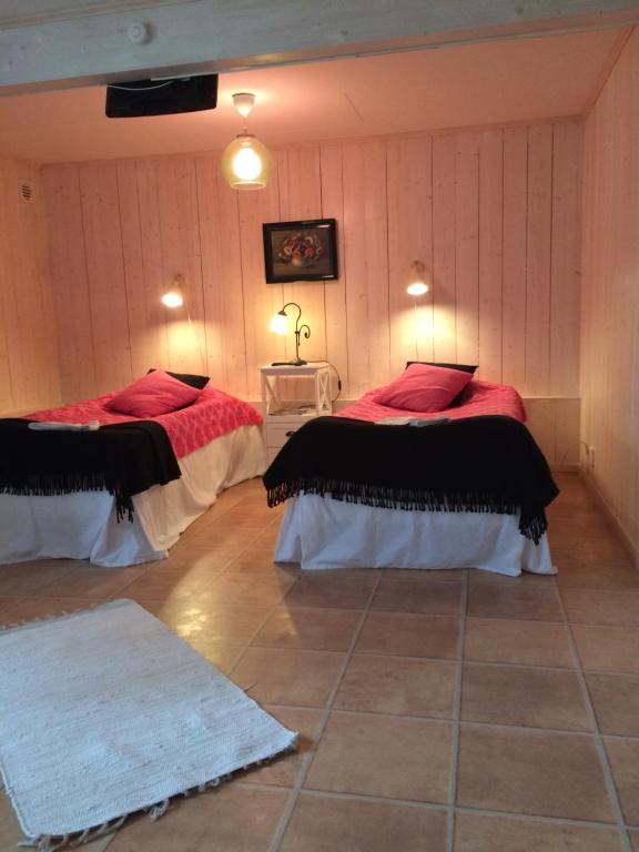 Postel nebo postele na pokoji v ubytování skummeslöv B & B