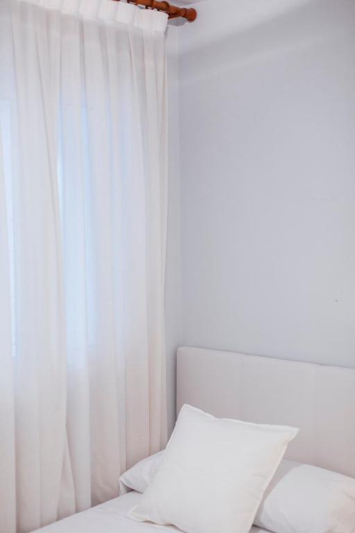 Postel nebo postele na pokoji v ubytování One & Lux- Lagar
