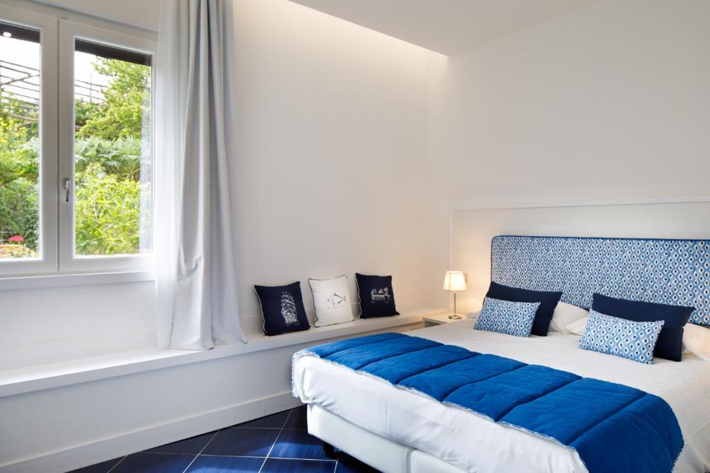Postel nebo postele na pokoji v ubytování Hotel Nice