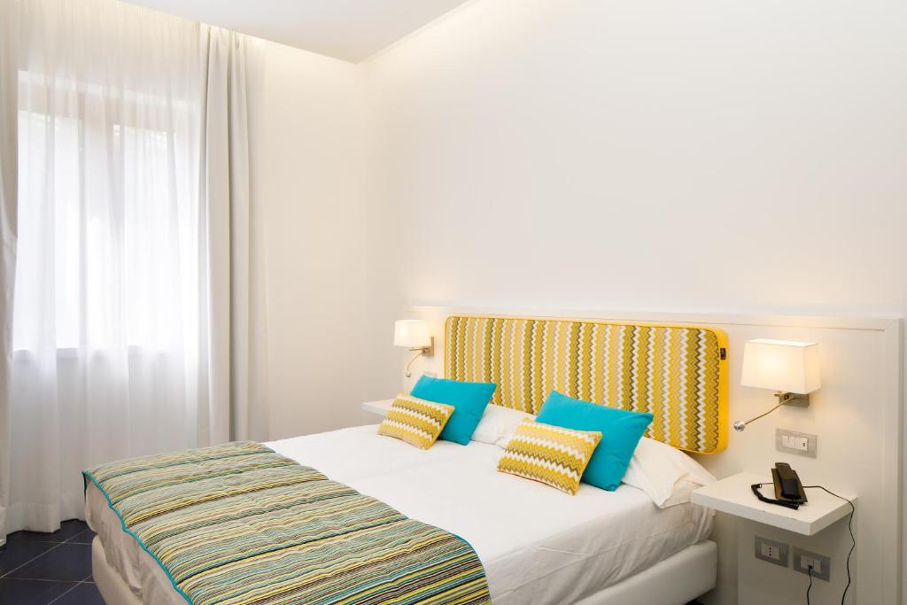 Postel nebo postele na pokoji v ubytování Hotel Nice