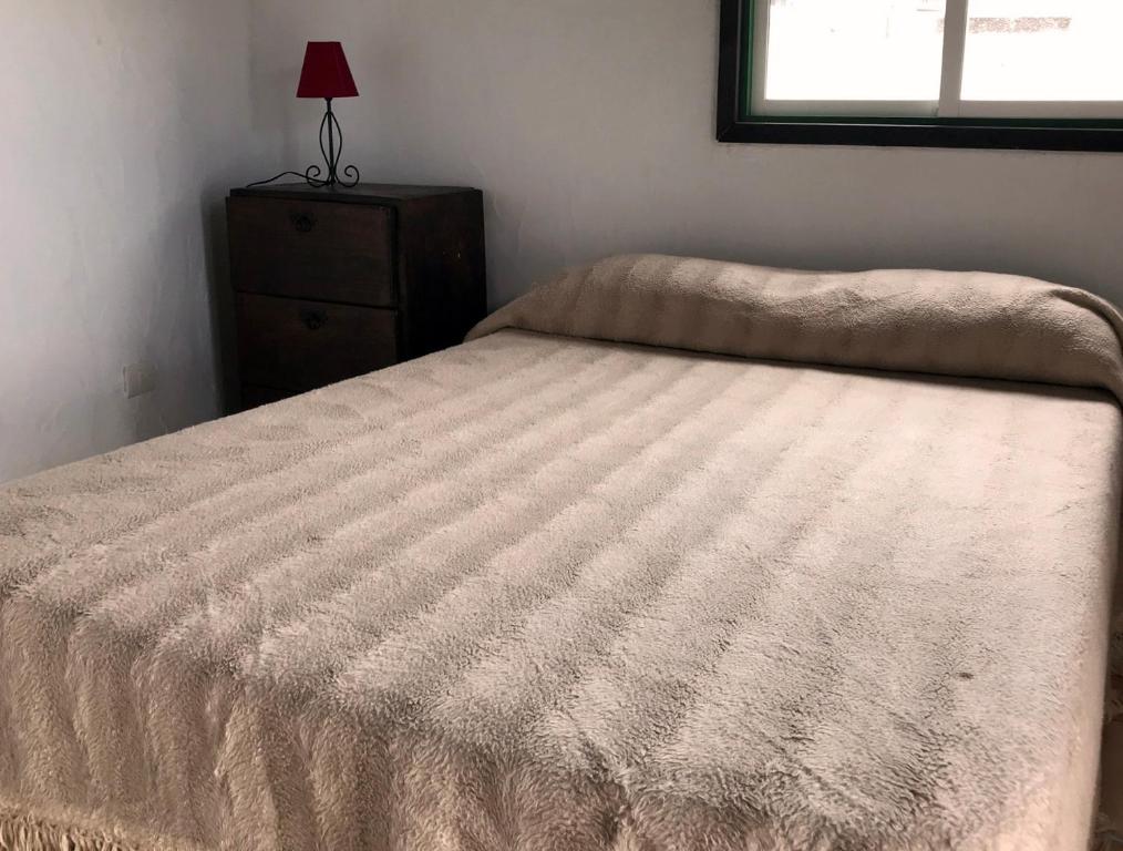 Postel nebo postele na pokoji v ubytování Casa Maria Luisa