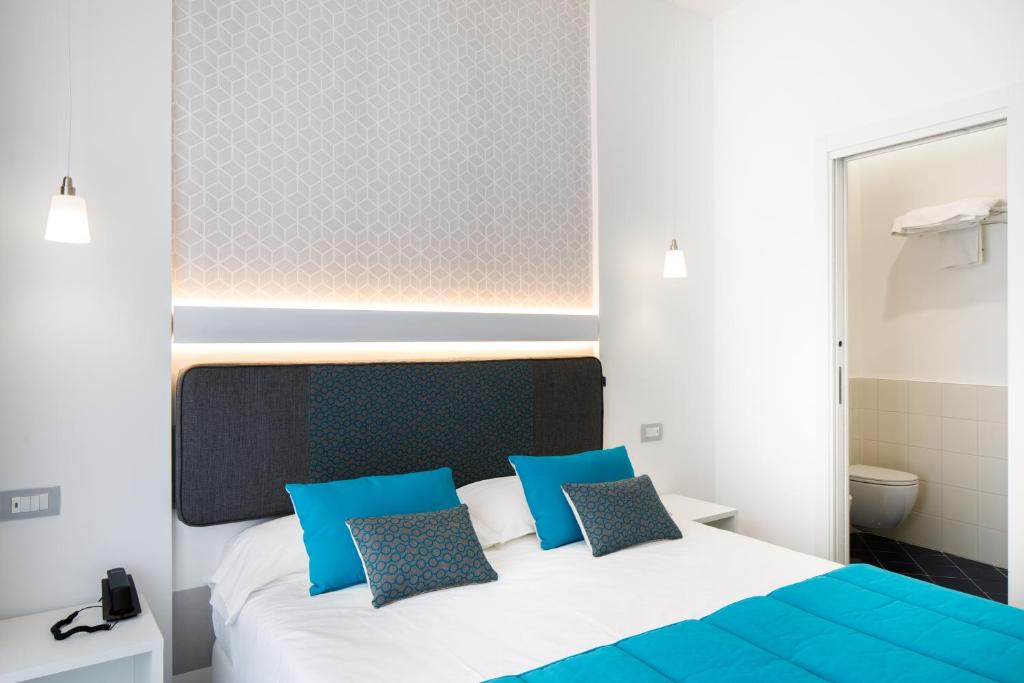 Postel nebo postele na pokoji v ubytování Hotel Nice