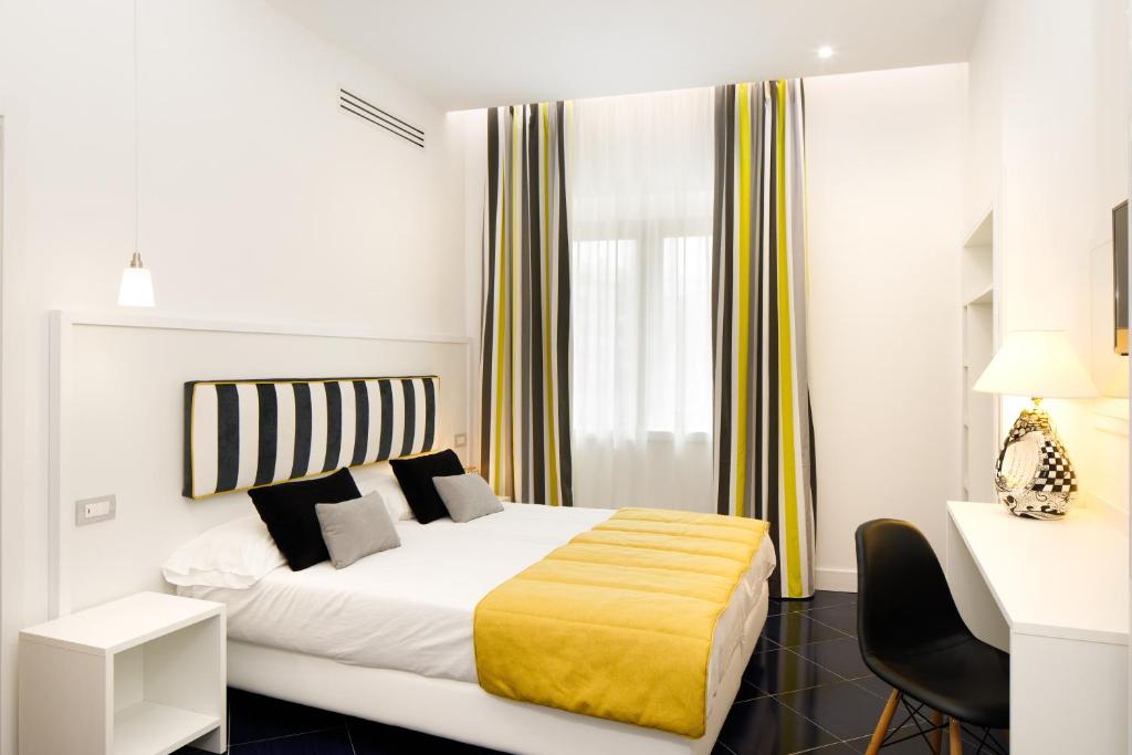 Postel nebo postele na pokoji v ubytování Hotel Nice