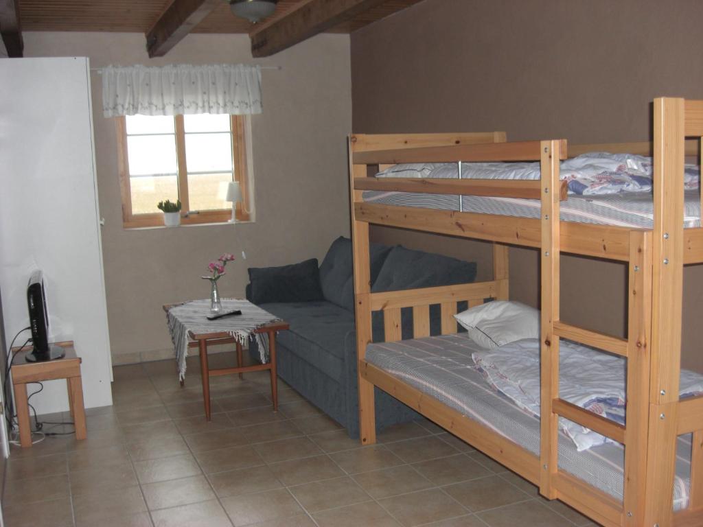 Postel nebo postele na pokoji v ubytování Hagestad 47