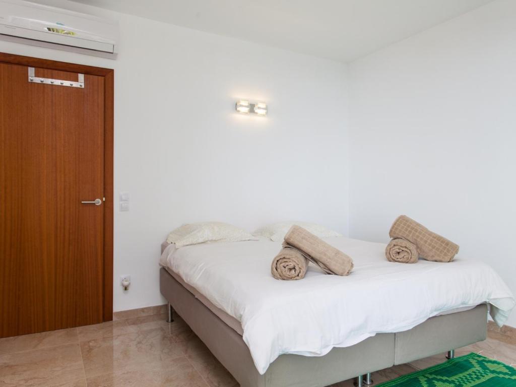 Posteľ alebo postele v izbe v ubytovaní Villa Estrella Sea View