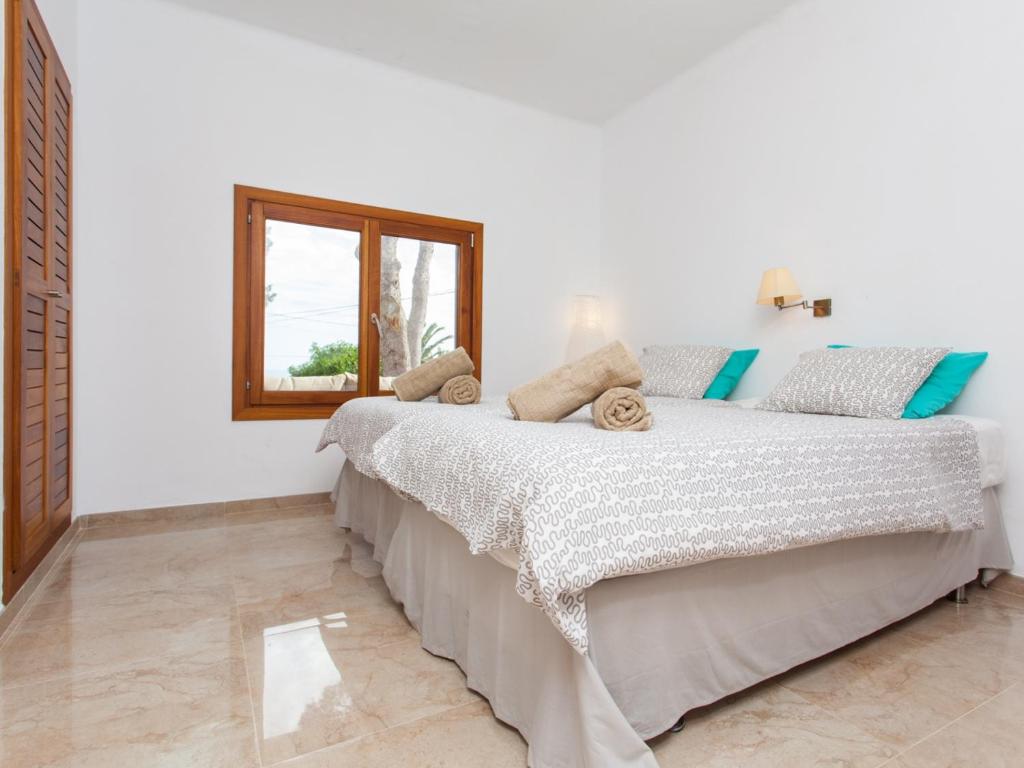 Posteľ alebo postele v izbe v ubytovaní Villa Estrella Sea View