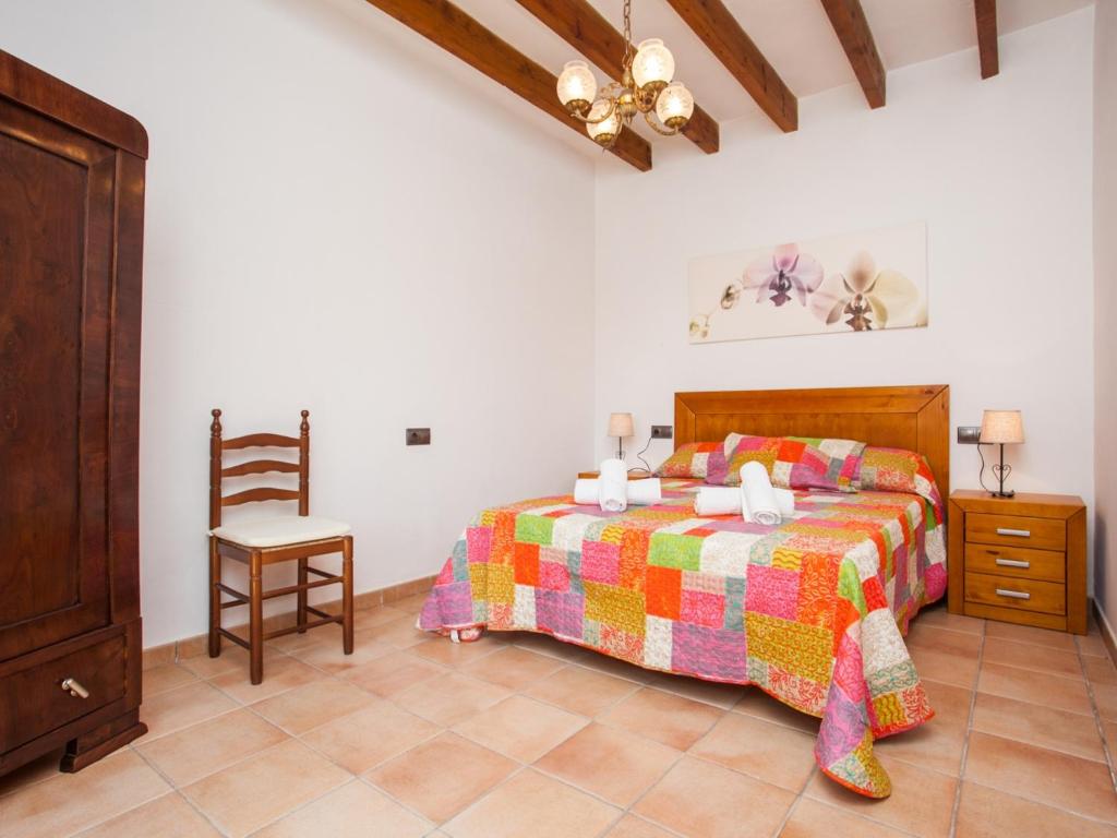 A bed or beds in a room at Finca Ses Comes