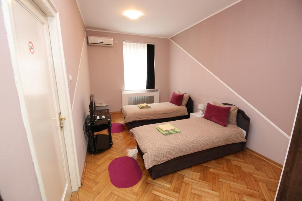 Postel nebo postele na pokoji v ubytování Hostel Fine