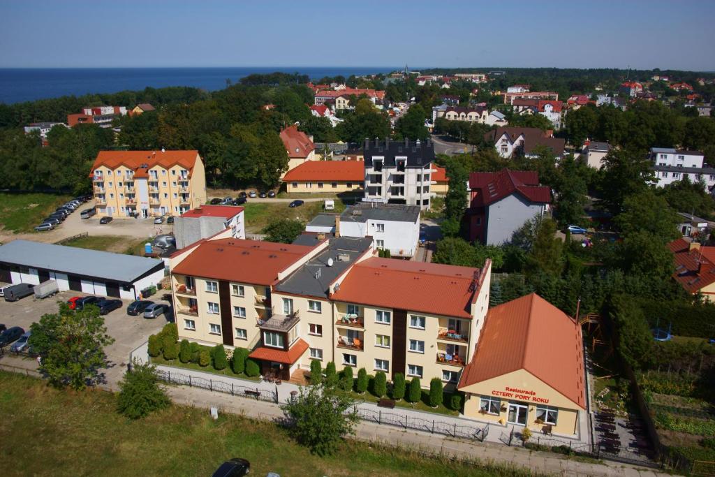 an aerial view of a town with buildings at Cztery Pory Roku in Ustronie Morskie