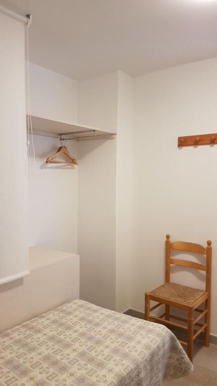 Postel nebo postele na pokoji v ubytování Apartaments Tropic