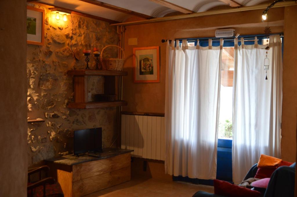 Posezení v ubytování Mas Ca La Coixa