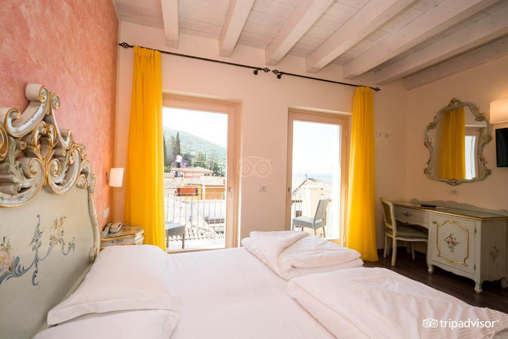Postel nebo postele na pokoji v ubytování Hotel Pai