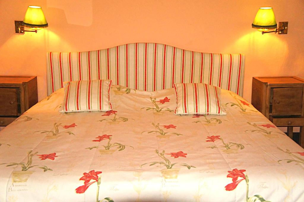 Postel nebo postele na pokoji v ubytování Casa de Sezim