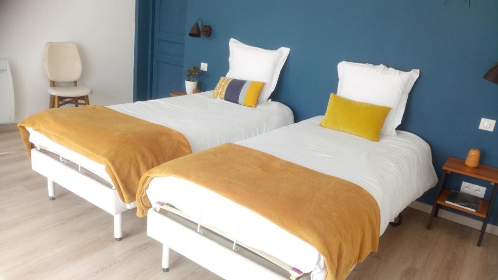 Postel nebo postele na pokoji v ubytování B&B CHEZ FOUCHS - Chambre d'hôtes