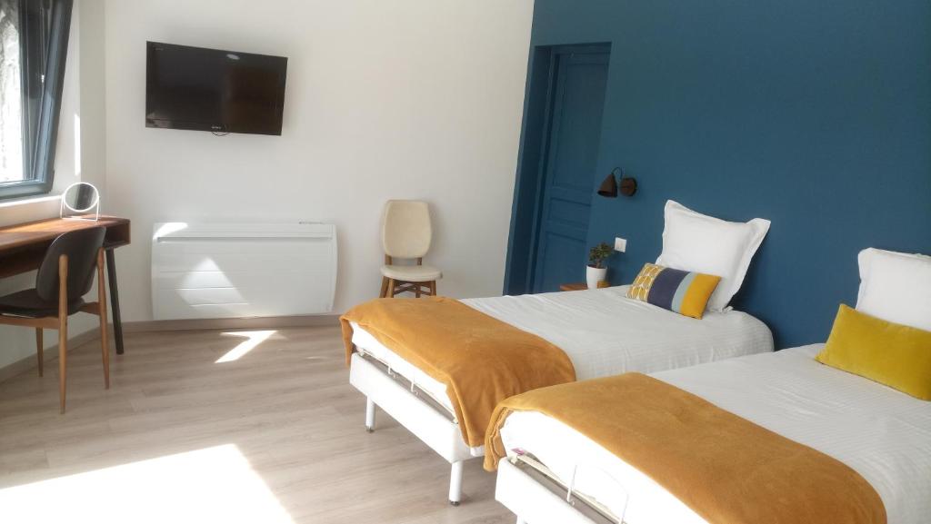 Postel nebo postele na pokoji v ubytování B&B CHEZ FOUCHS - Chambre d'hôtes