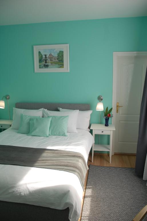 Posteľ alebo postele v izbe v ubytovaní Joy Guesthouse