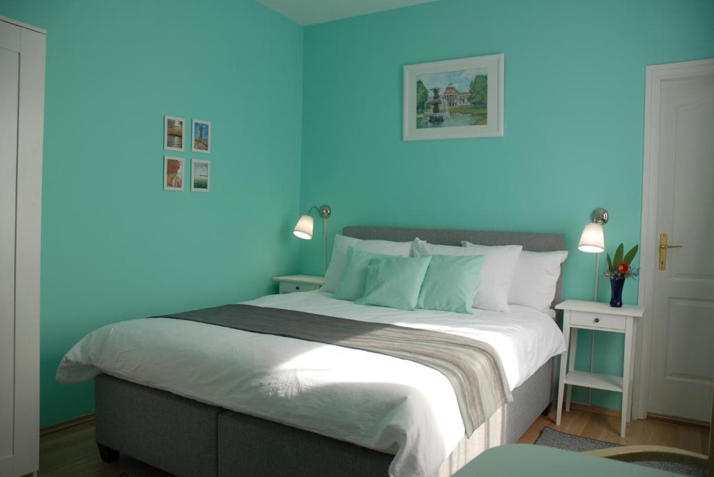 Posteľ alebo postele v izbe v ubytovaní Joy Guesthouse