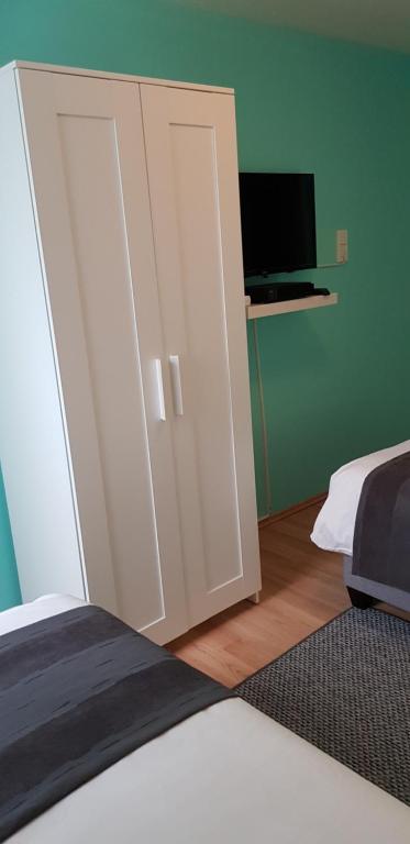 Posteľ alebo postele v izbe v ubytovaní Joy Guesthouse