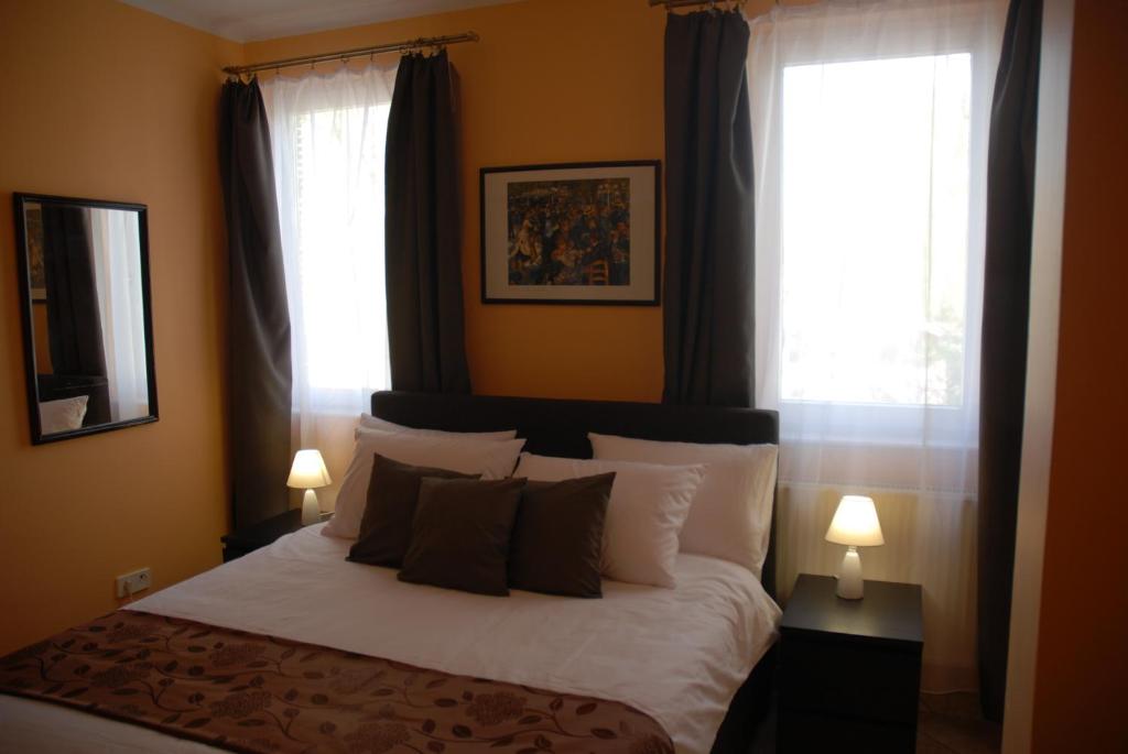 Posteľ alebo postele v izbe v ubytovaní Joy Guesthouse