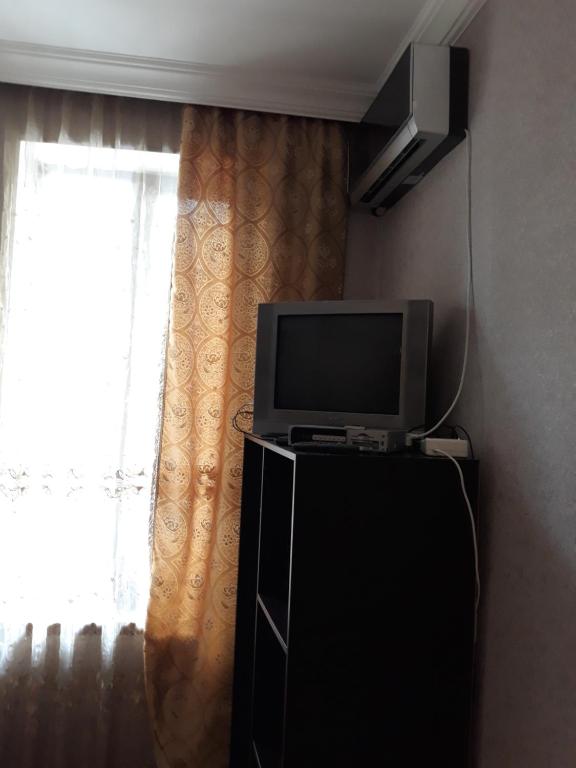 TV a/nebo společenská místnost v ubytování Guesthouse Gia