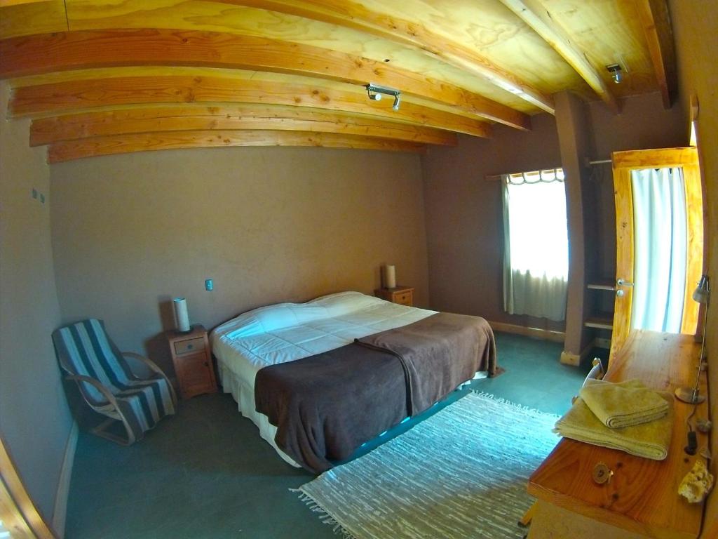 Postel nebo postele na pokoji v ubytování Terra Luna Atacama