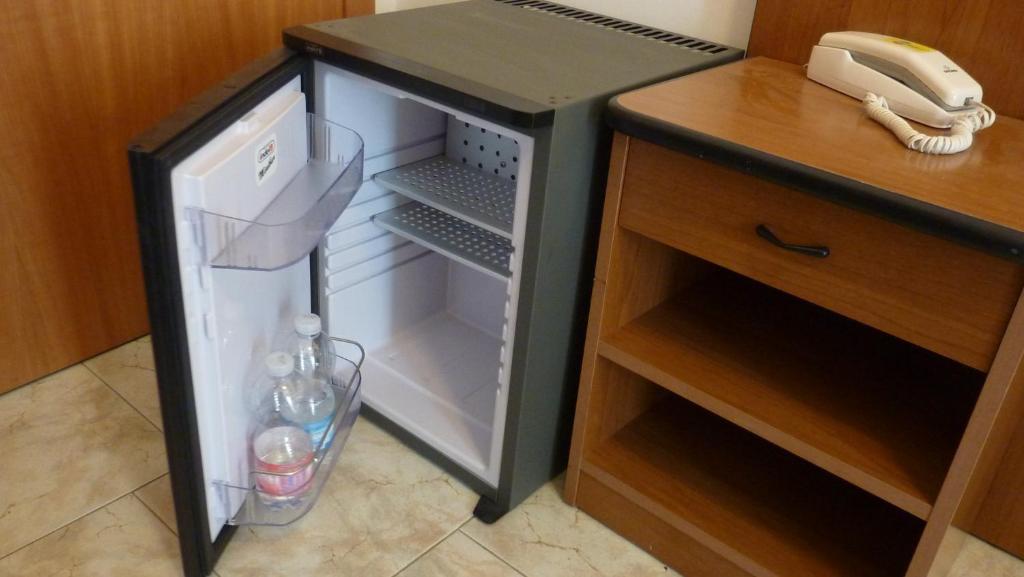 Kuchyň nebo kuchyňský kout v ubytování Hotel Samoa