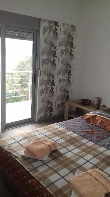 Łóżko lub łóżka w pokoju w obiekcie Apartment Sorelle