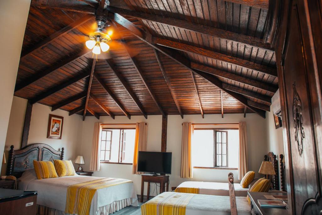 TV a/nebo společenská místnost v ubytování Hotel Antigua Miraflores
